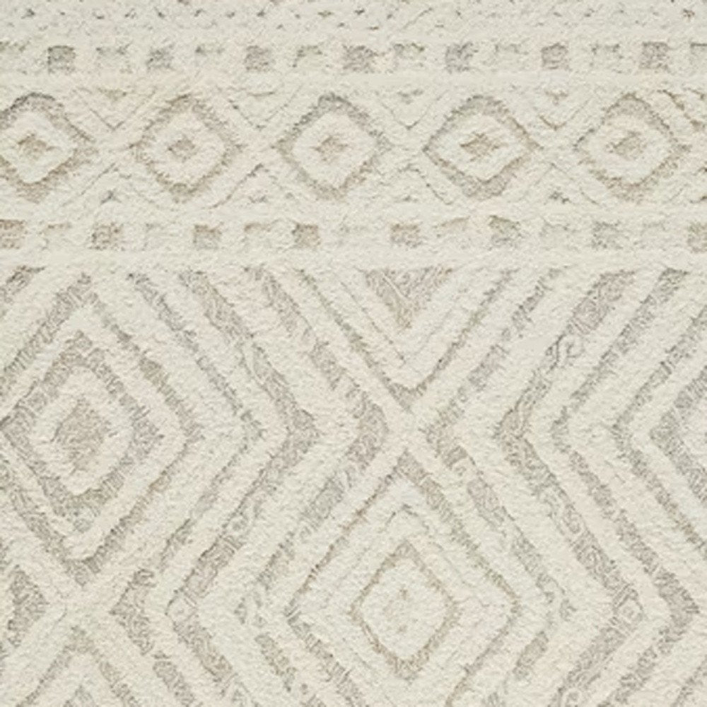 4' X 6' Ivory And Tan Wool Geometric Tufted Handmade Stain Resistant Area Rug