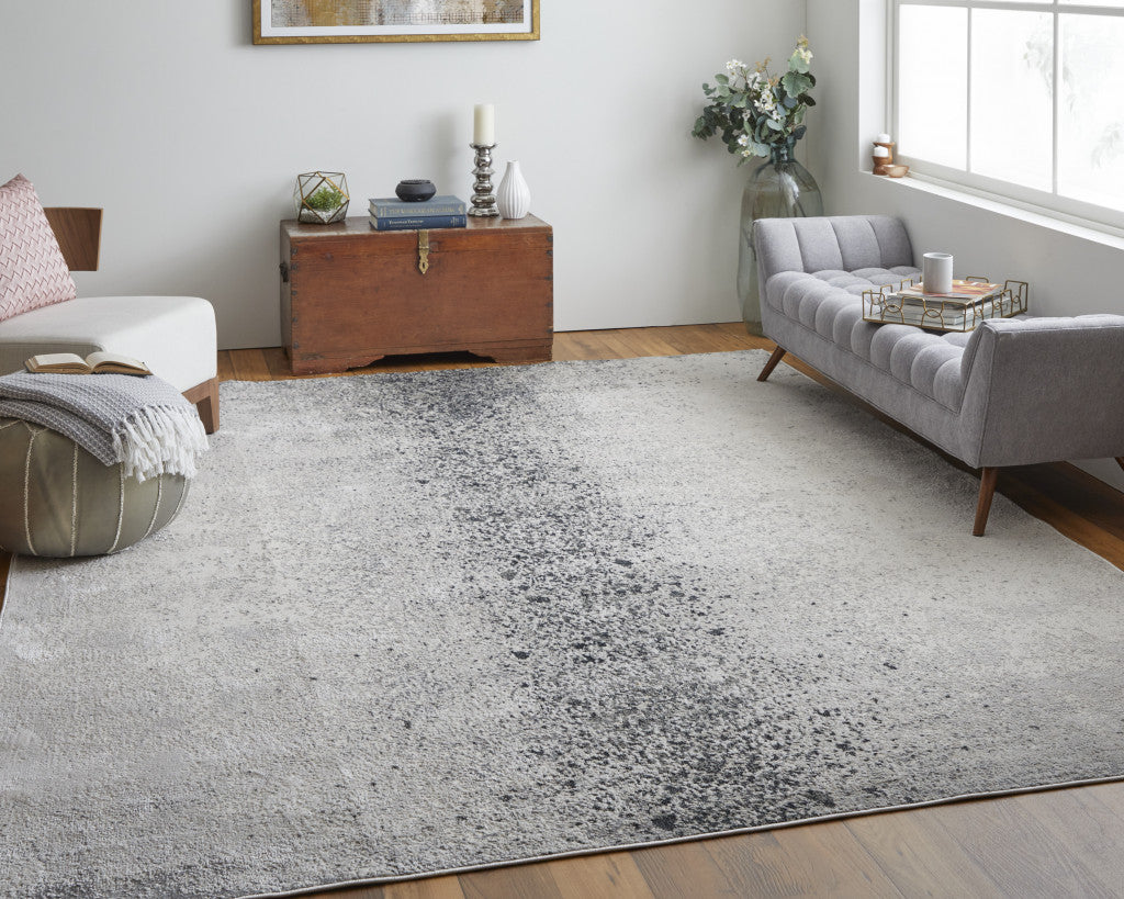 10' X 13' Ivory And Blue Abstract Power Loom Area Rug
