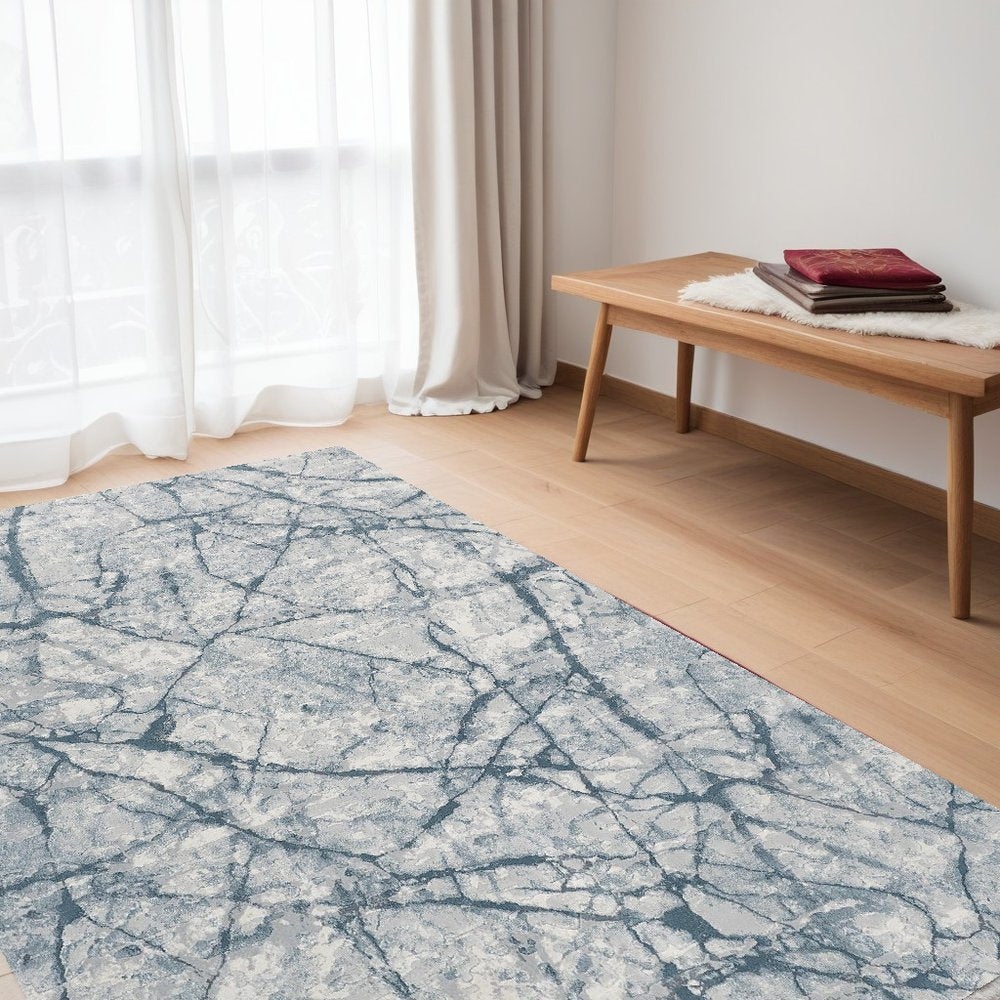 2' X 3' Blue Gray And Ivory Abstract Distressed Stain Resistant Area Rug