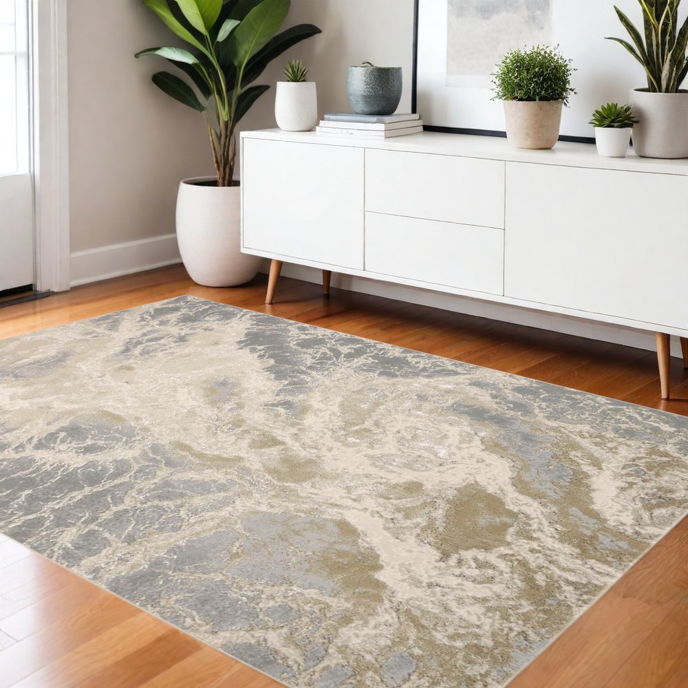 4' X 6' Ivory Tan And Gray Abstract Area Rug