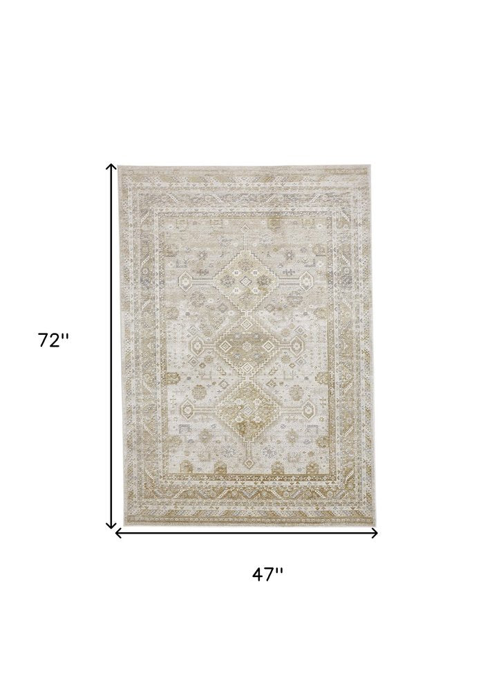 5' X 8' Gold And Ivory Floral Stain Resistant Area Rug