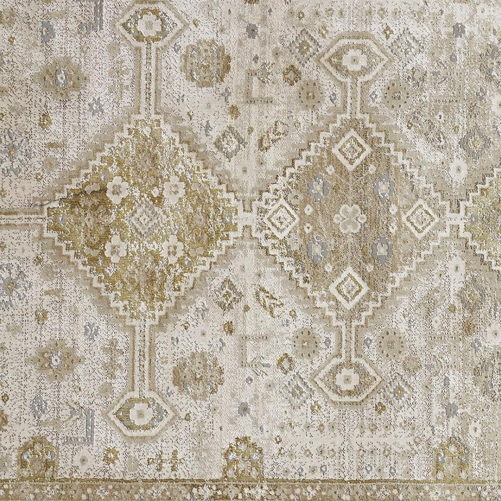 5' X 8' Gold And Ivory Floral Stain Resistant Area Rug