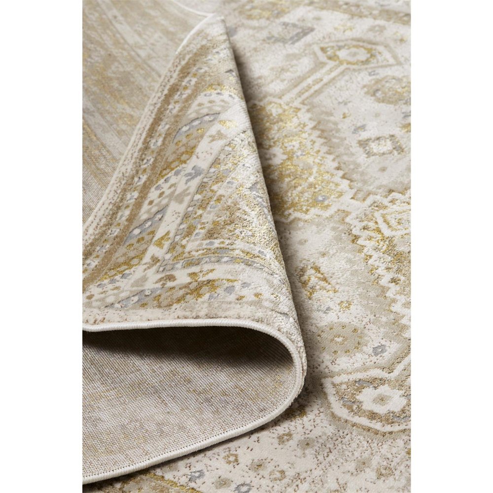 5' X 8' Gold And Ivory Floral Stain Resistant Area Rug