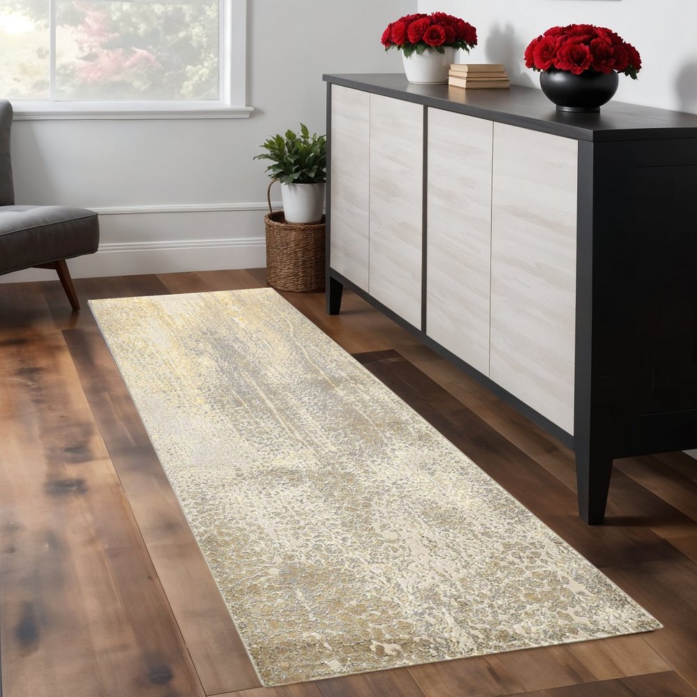 4' X 6' Gold Gray And Ivory Abstract Area Rug