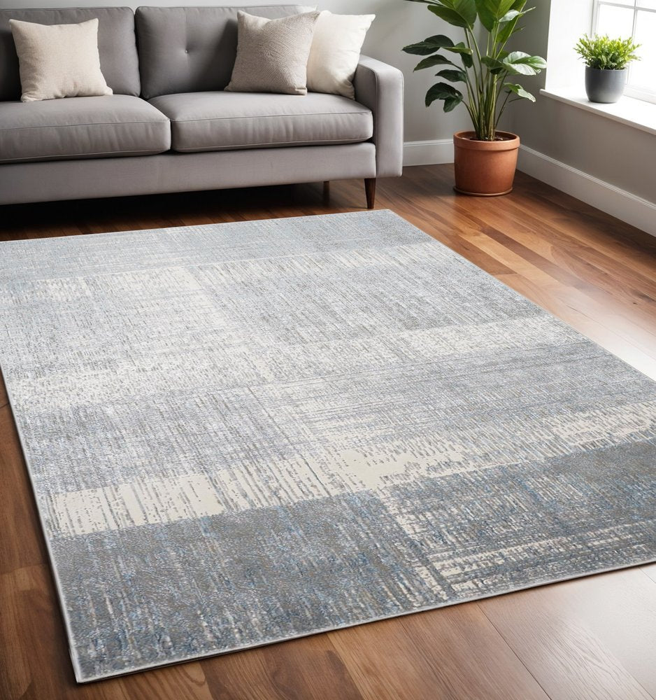 5' X 8' Blue And Gray Abstract Area Rug