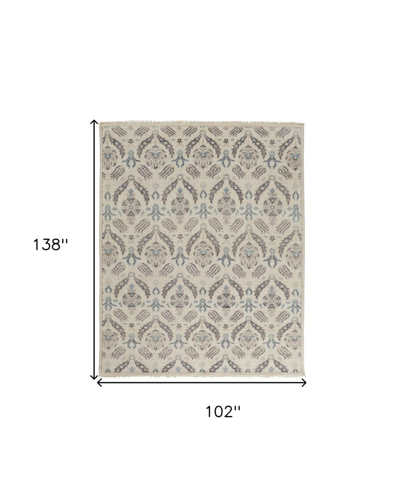8' X 10' Ivory Gray And Blue Wool Floral Hand Knotted Stain Resistant Area Rug