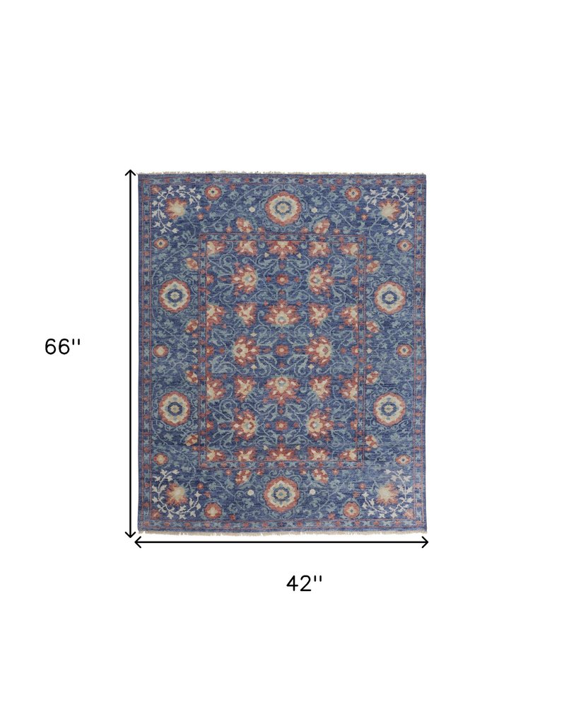 8' X 10' Blue And Red Wool Floral Hand Knotted Stain Resistant Area Rug