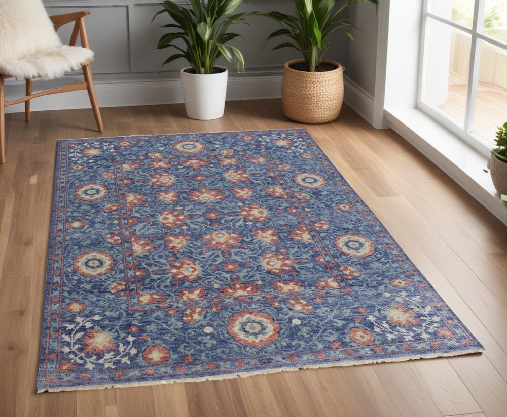 8' X 10' Blue And Red Wool Floral Hand Knotted Stain Resistant Area Rug