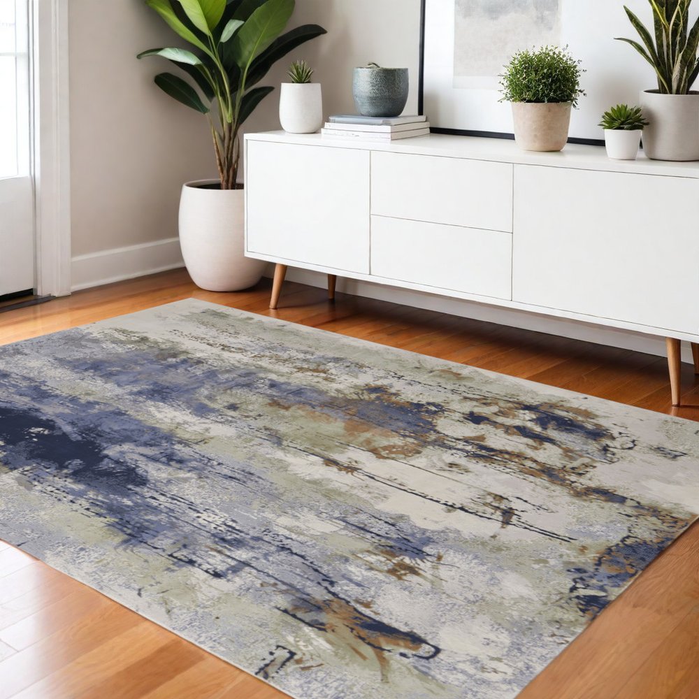 4' X 6' Blue Orange And Ivory Abstract Area Rug