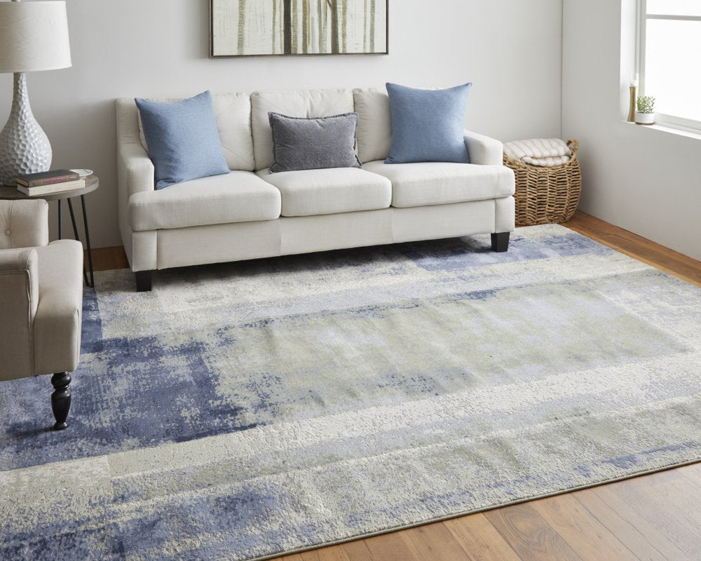 4' X 6' Blue Green And Ivory Abstract Distressed Area Rug