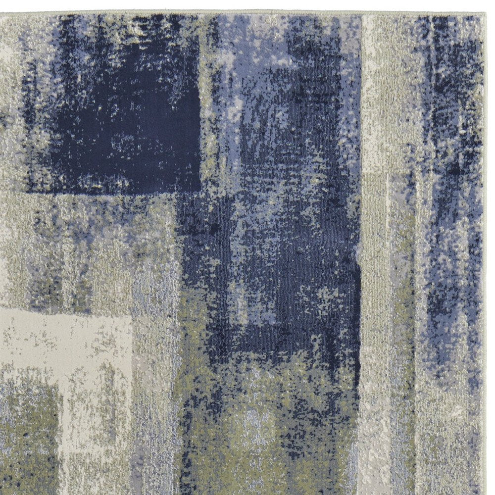 4' X 6' Blue Green And Ivory Abstract Distressed Area Rug