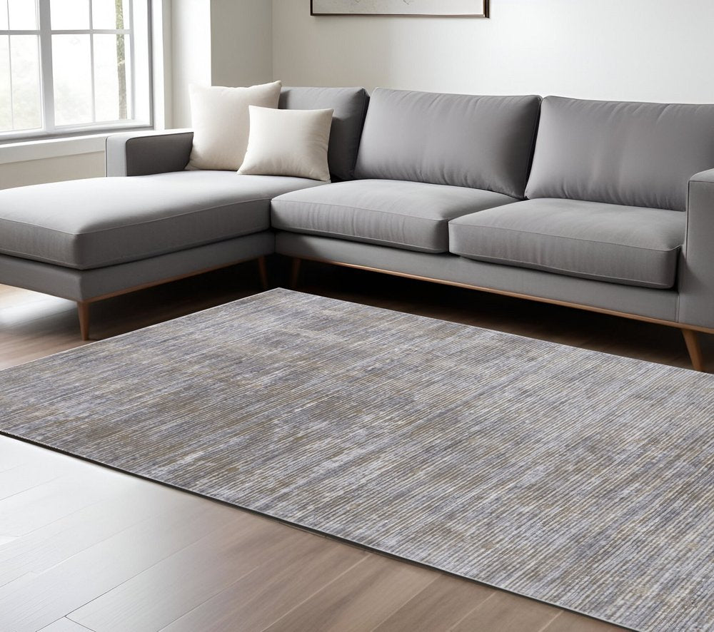 8' X 10' Taupe Silver and Tan Abstract Power Loom Non Skid Area Rug