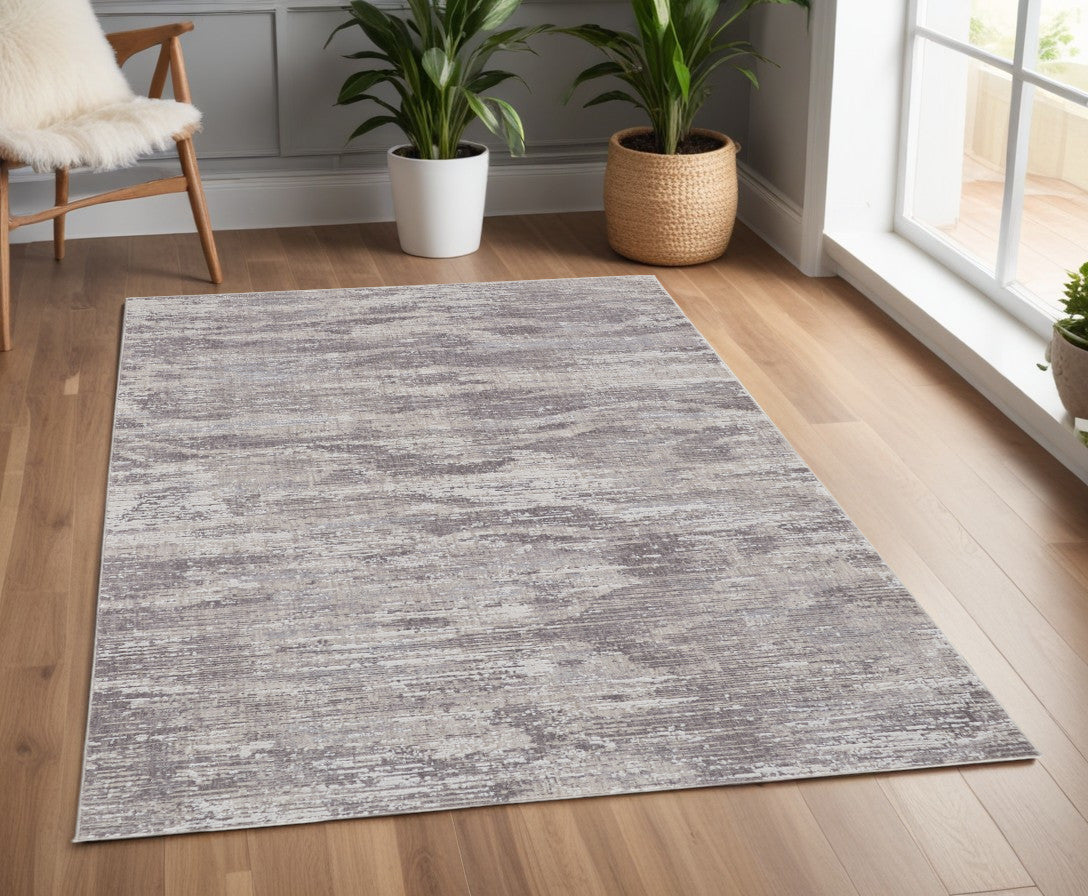4' X 6' Tan and Gray Abstract Power Loom Distressed Area Rug