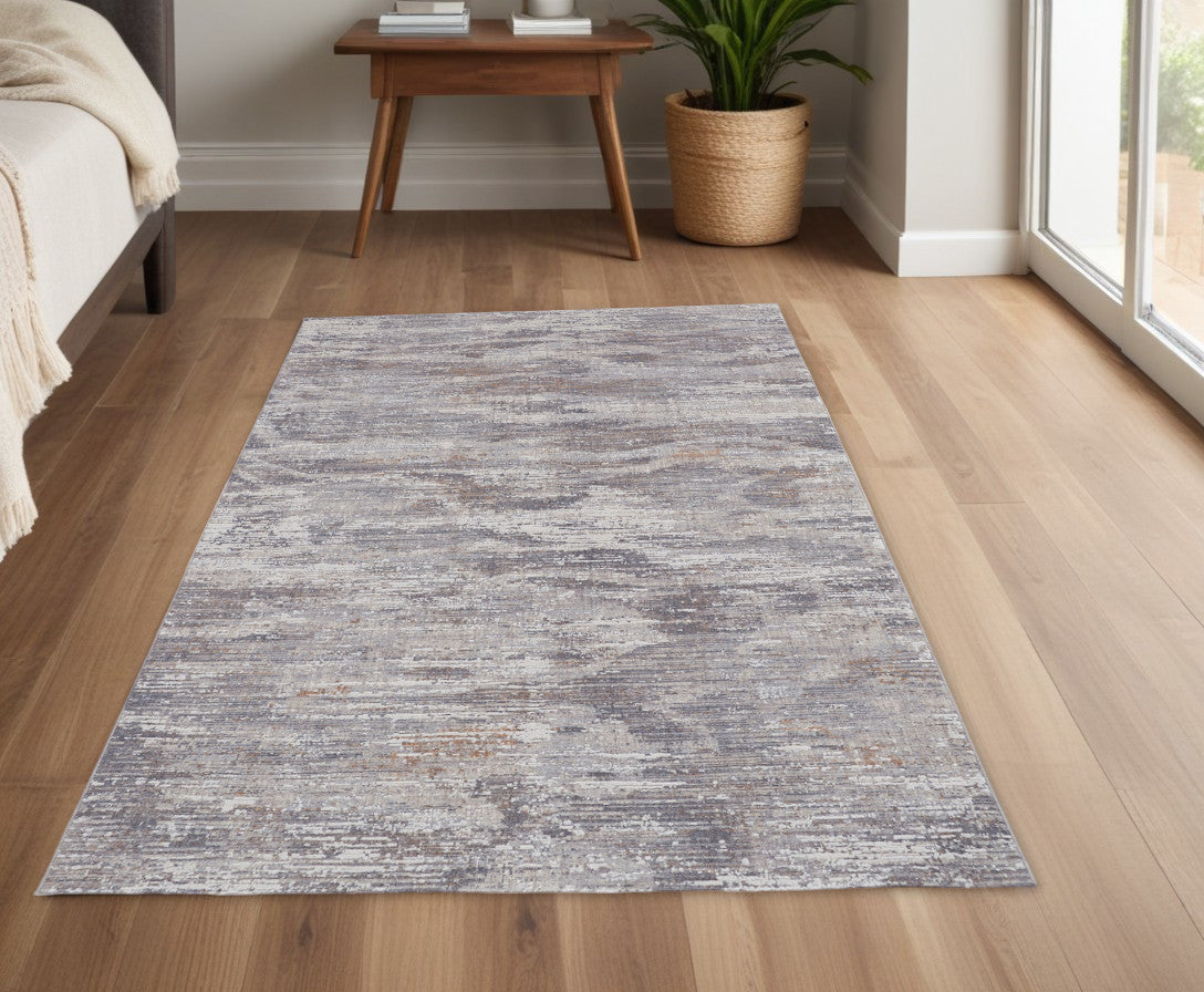 4' X 6' Tan and Gray Abstract Power Loom Distressed Area Rug