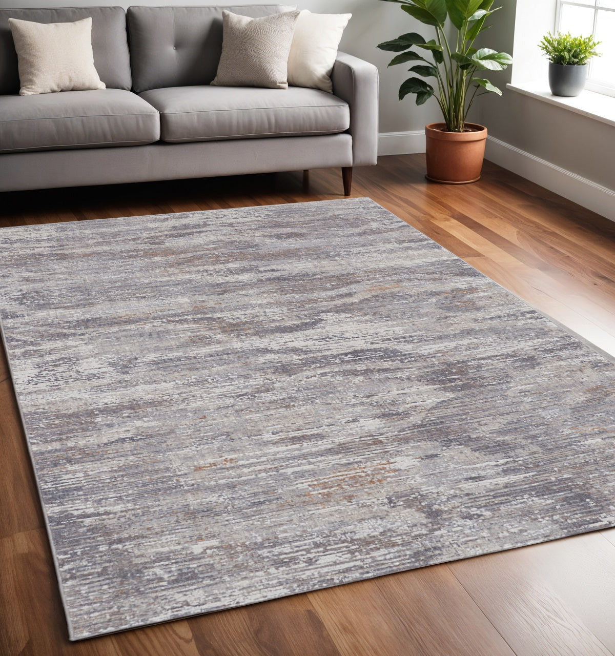 4' X 6' Tan and Gray Abstract Power Loom Distressed Area Rug