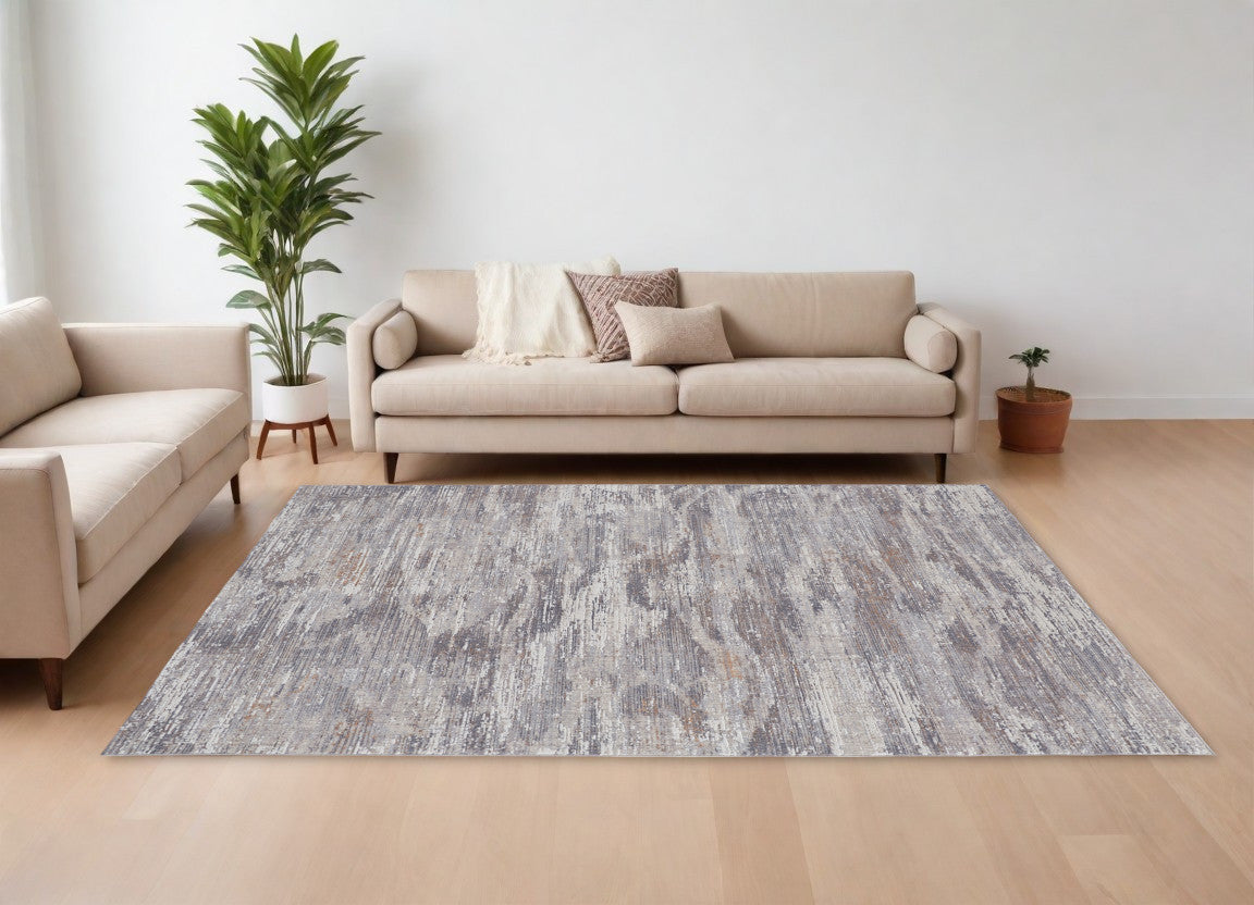 4' X 6' Tan and Gray Abstract Power Loom Distressed Area Rug