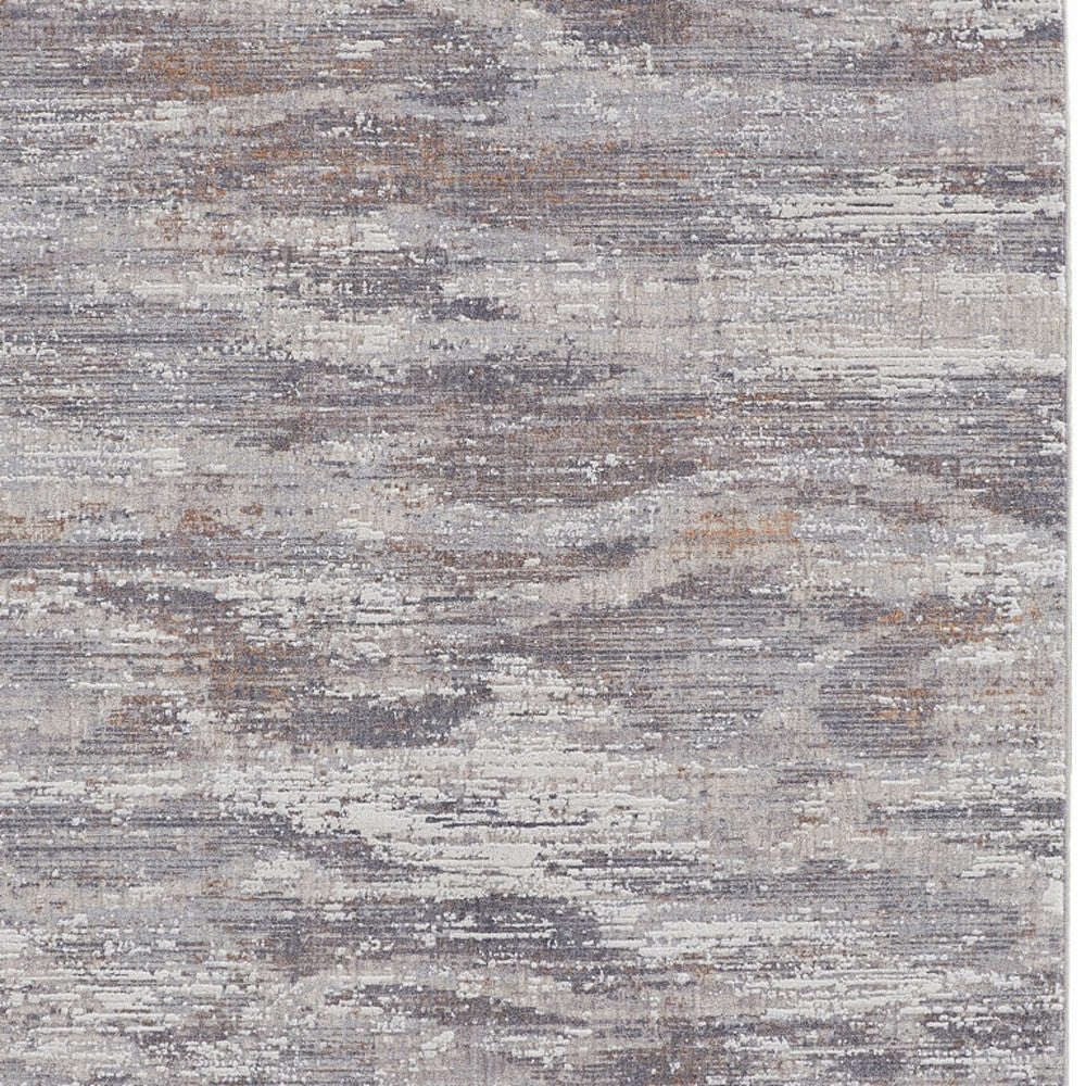 4' X 6' Tan and Gray Abstract Power Loom Distressed Area Rug
