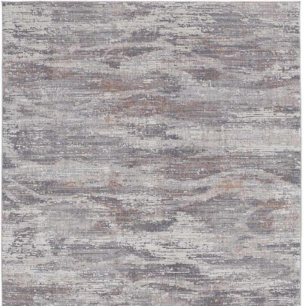 4' X 6' Tan and Gray Abstract Power Loom Distressed Area Rug