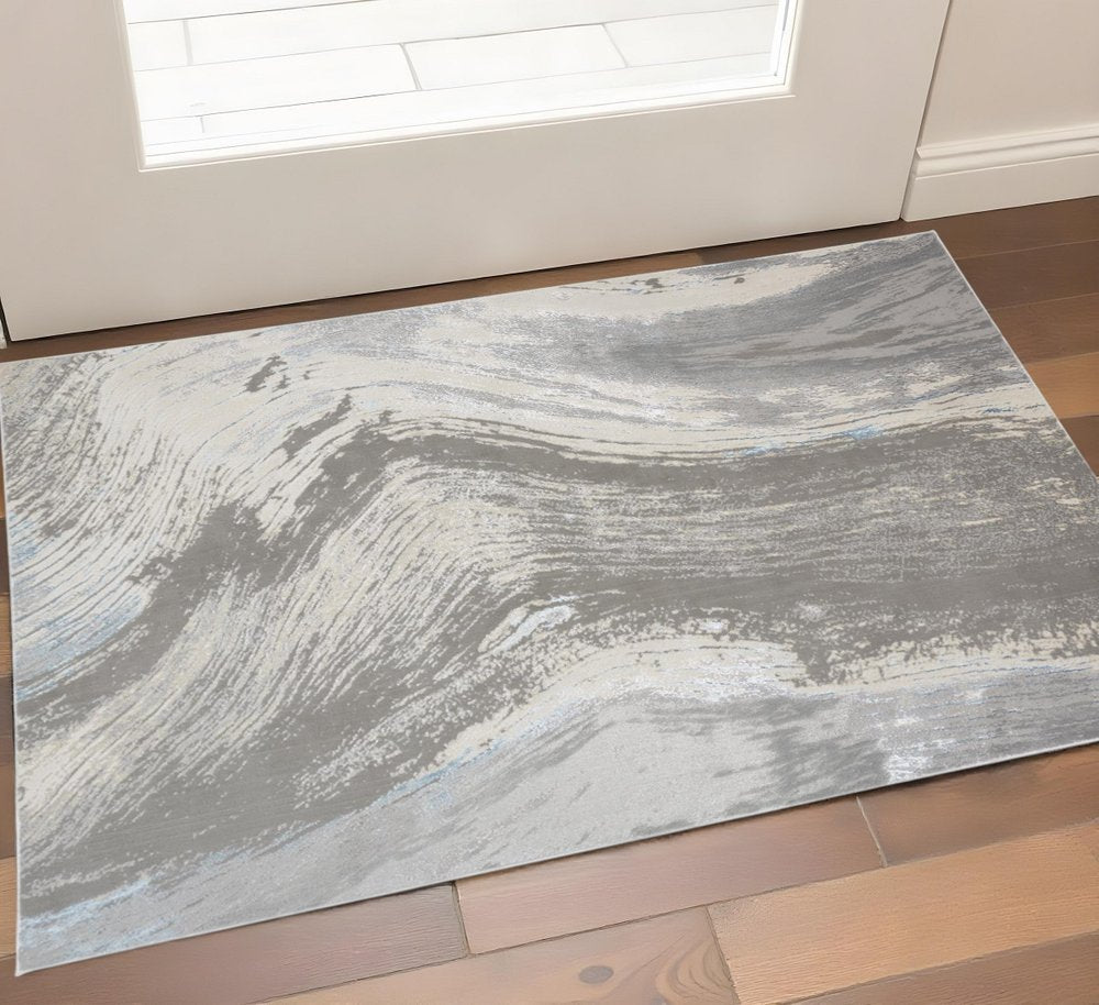2' X 3' Gray Ivory And Blue Abstract Area Rug