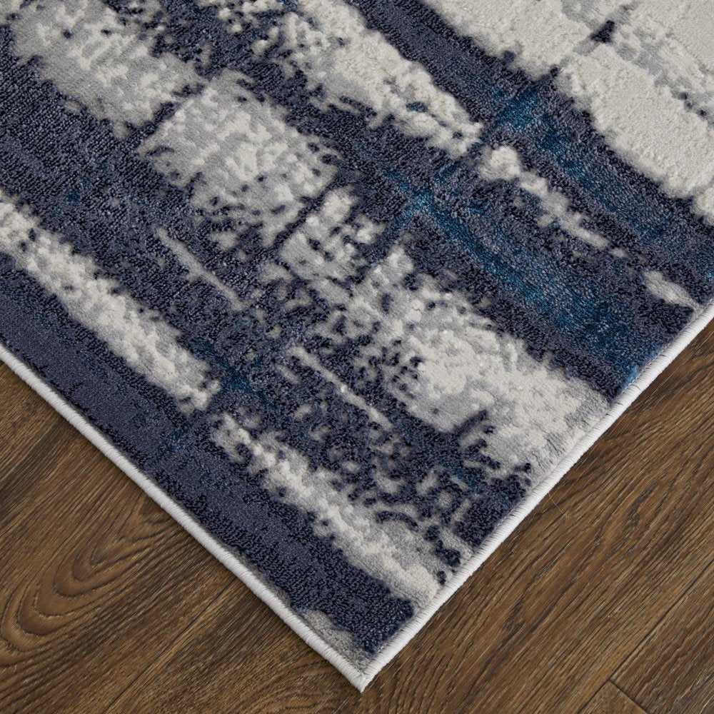 2' X 3' Ivory Blue And Gray Abstract Power Loom Distressed Area Rug