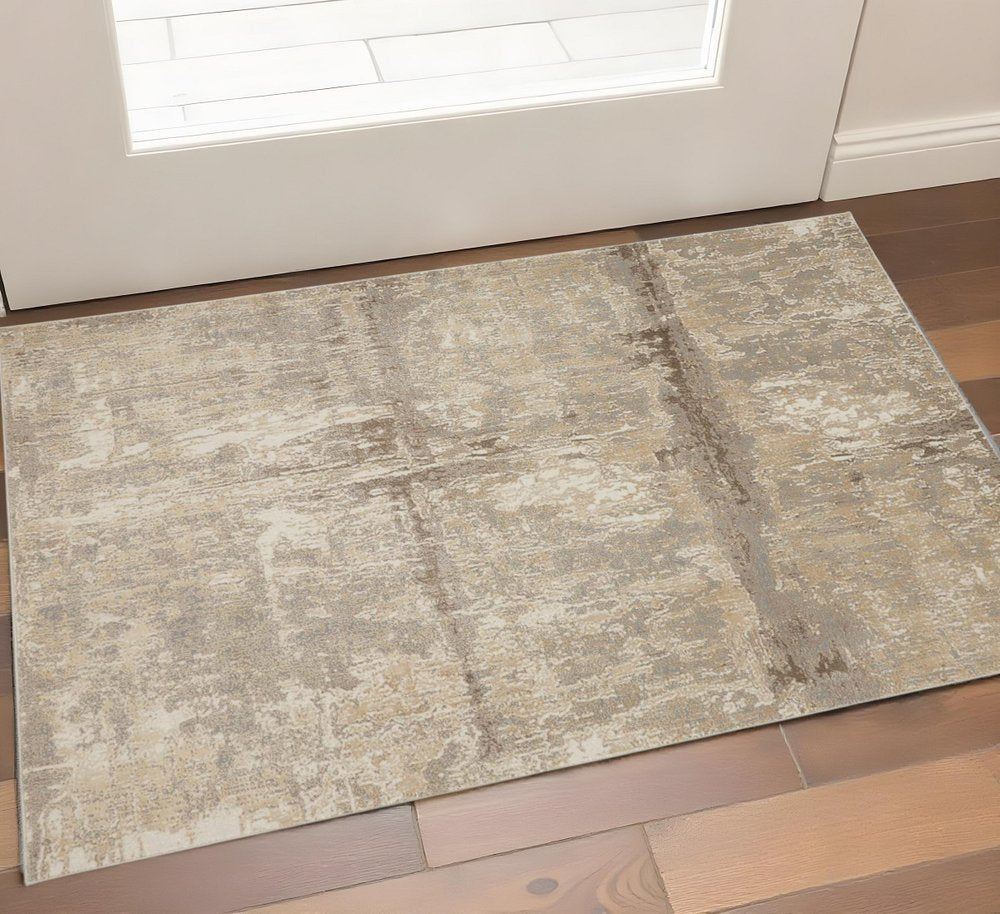 2' X 3' Tan Ivory And Brown Abstract Area Rug