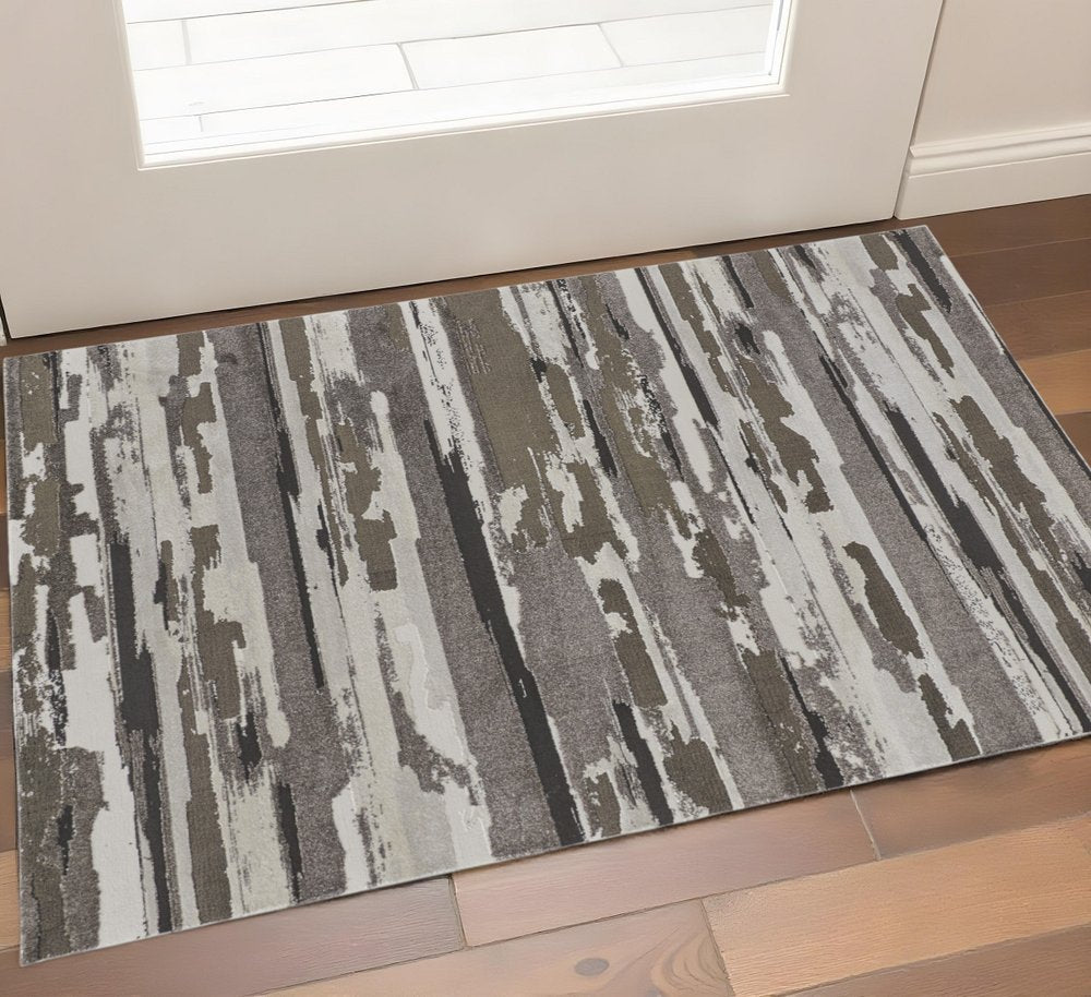 2' X 3' Gray Ivory And Brown Abstract Distressed Area Rug