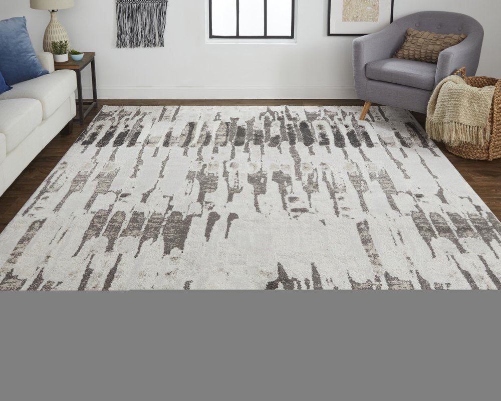 2' X 3' Gray and Ivory Abstract Power Loom Area Rug