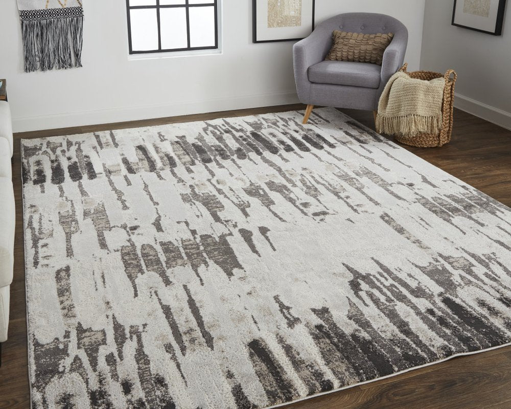 2' X 3' Gray and Ivory Abstract Power Loom Area Rug