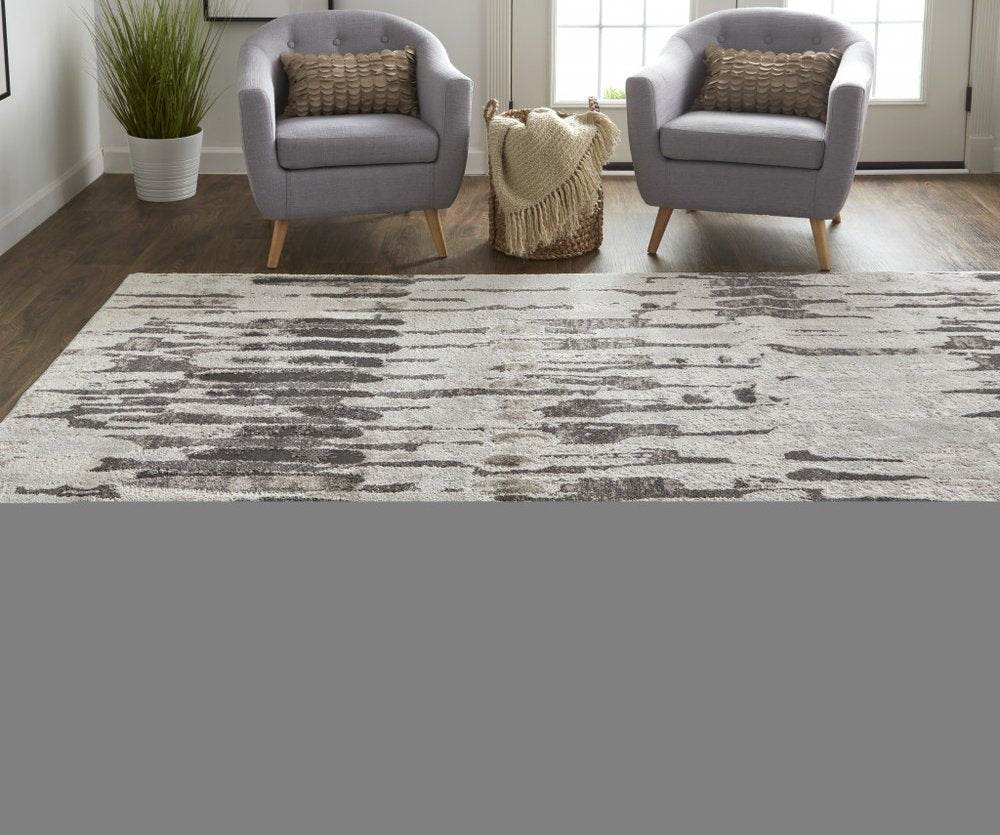 2' X 3' Gray and Ivory Abstract Power Loom Area Rug