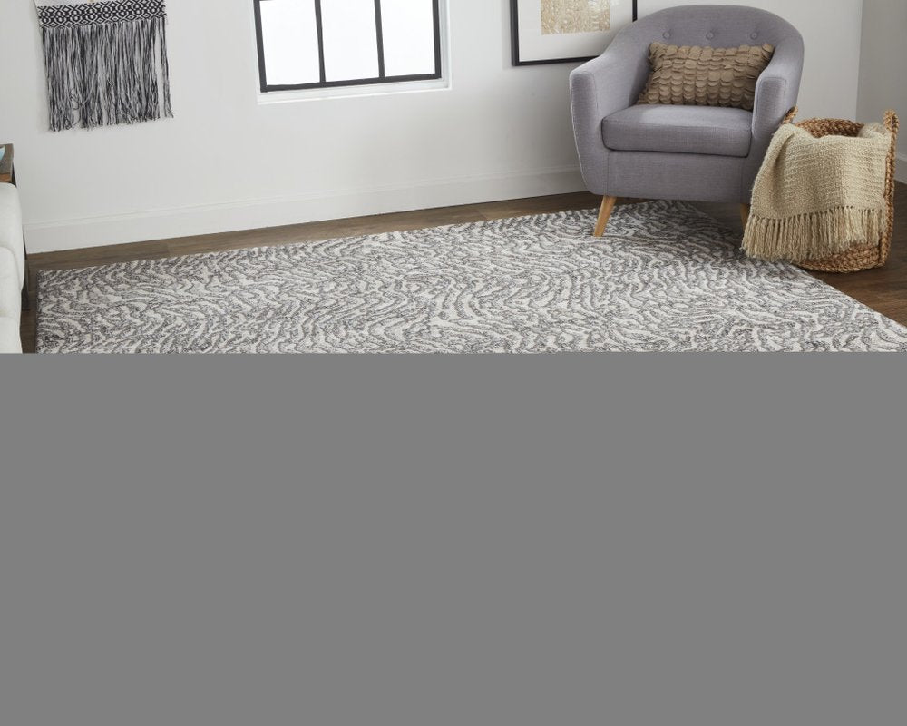 2' X 3' Gray and Ivory Abstract Power Loom Area Rug