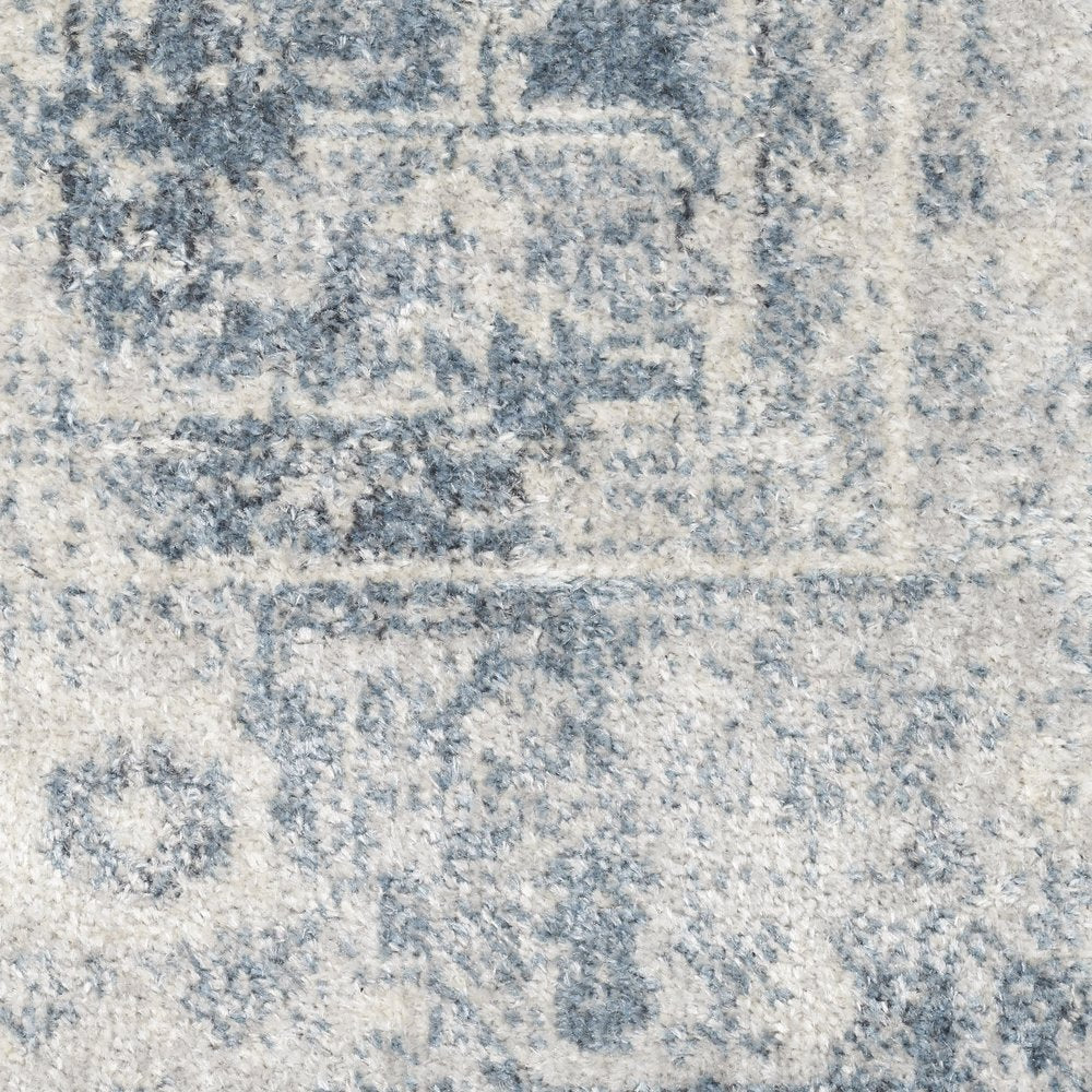 9' X 12' Blue and Ivory Oriental Power Loom Distressed Area Rug