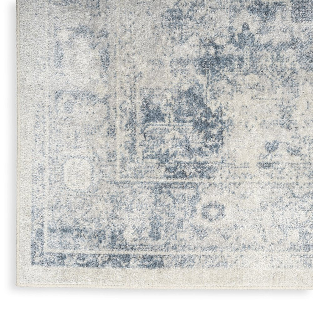 5' X 7' Blue Oriental Power Loom Distressed Washable Area Rug