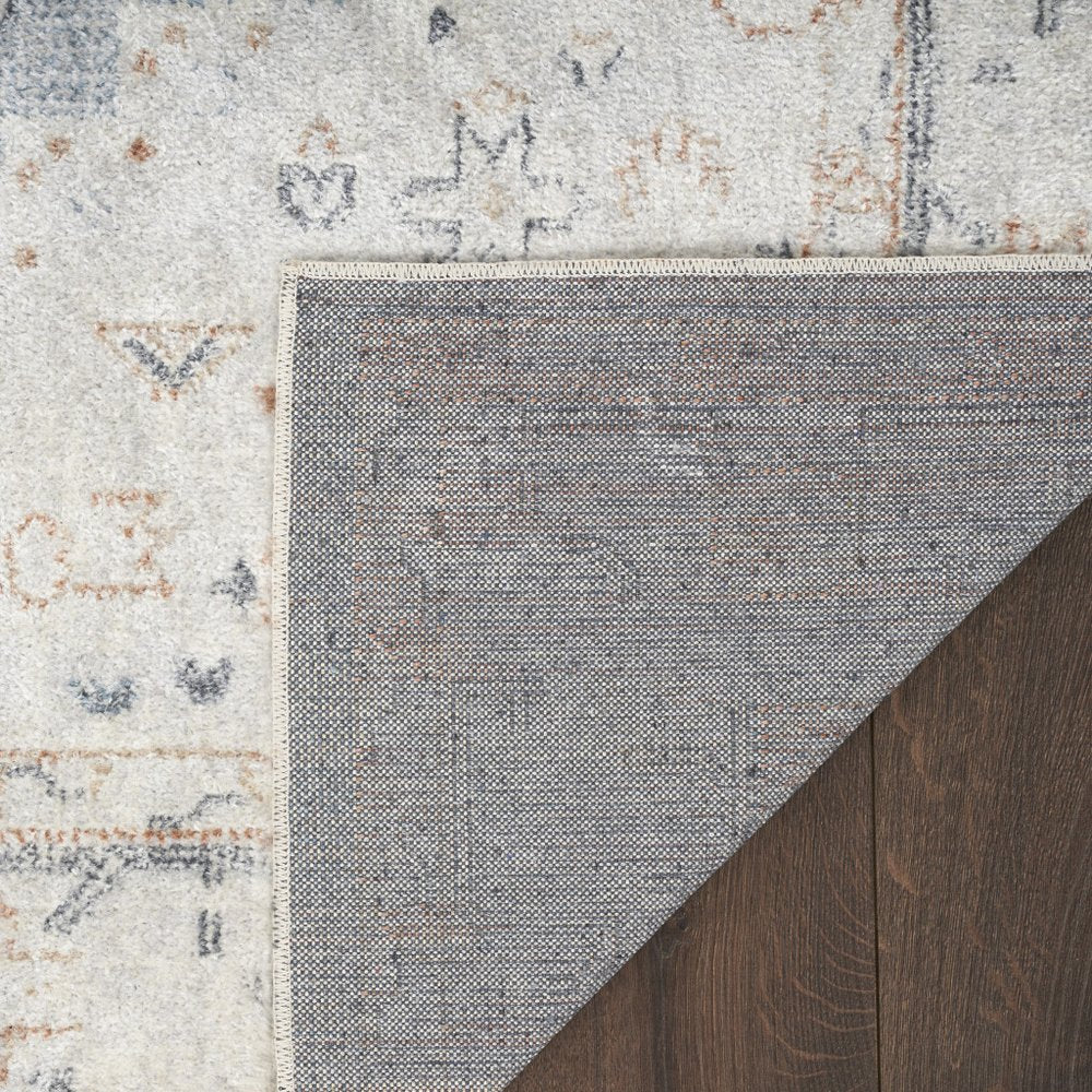 7' X 9' Light Blue Oriental Power Loom Distressed Washable Area Rug