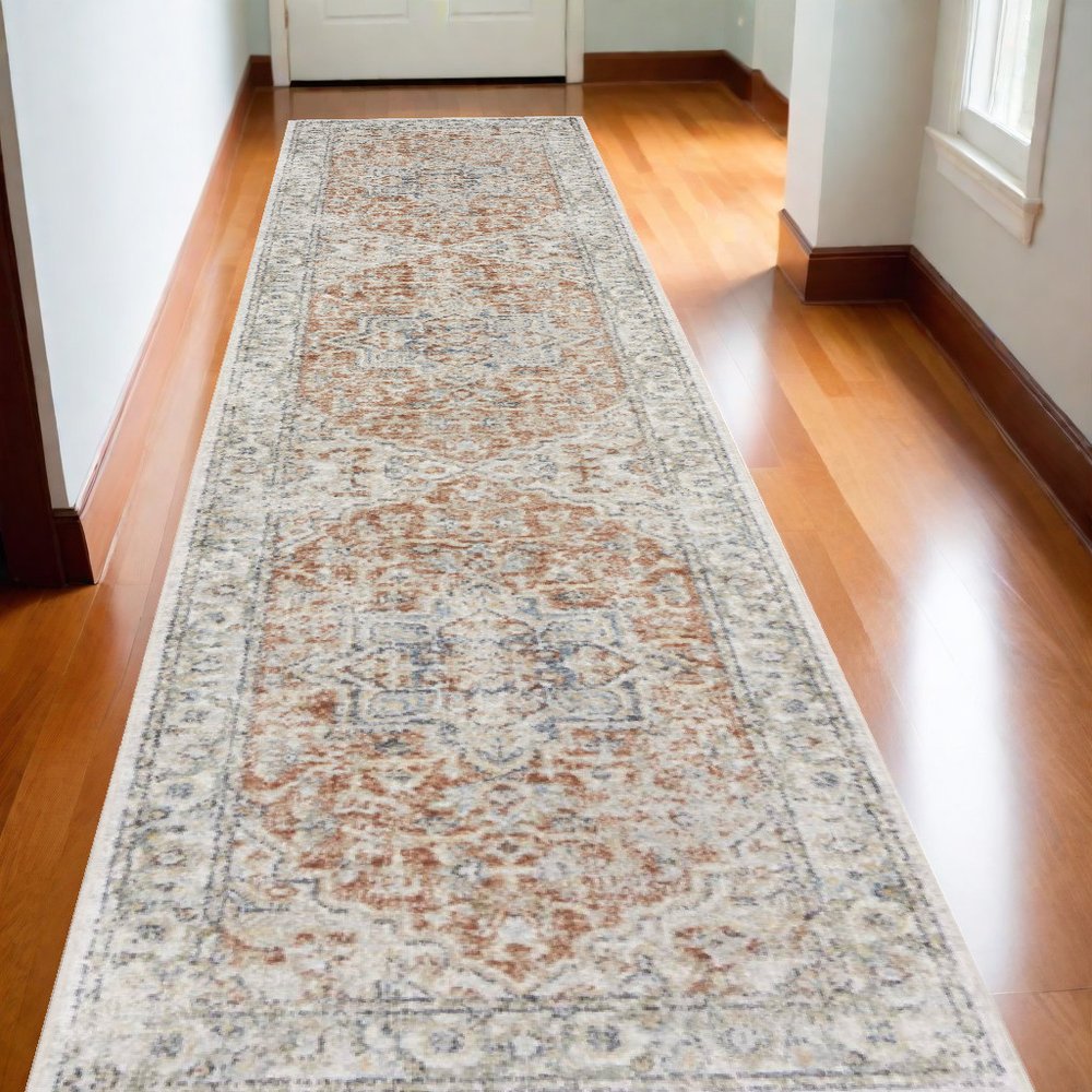 12' Gold And Ivory Oriental Washable Runner Rug