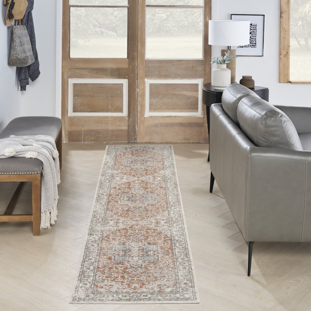 12' Gold And Ivory Oriental Washable Runner Rug