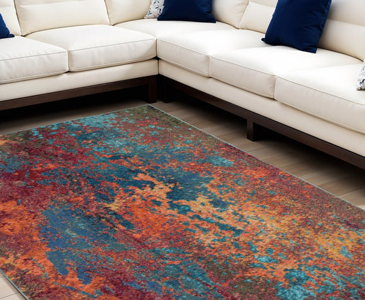 8' X 11' Blue and Orange Abstract Power Loom Area Rug