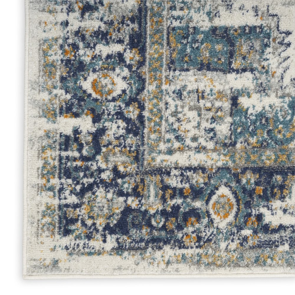 5' X 7' Cream Floral Power Loom Distressed Area Rug