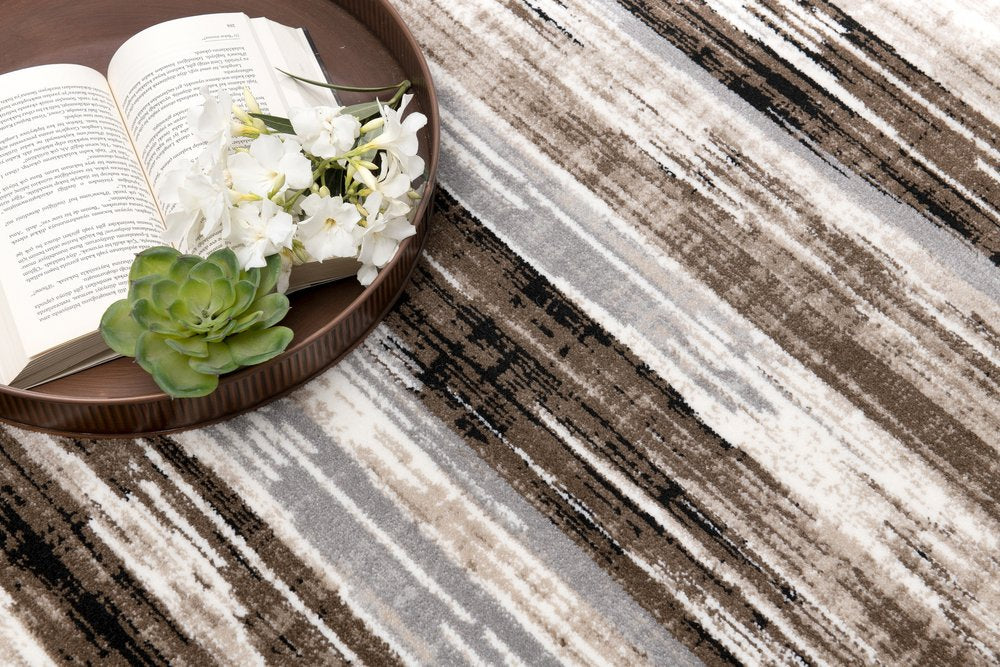 2' X 3' Brown Ivory and Tan Abstract Washable Non Skid Area Rug