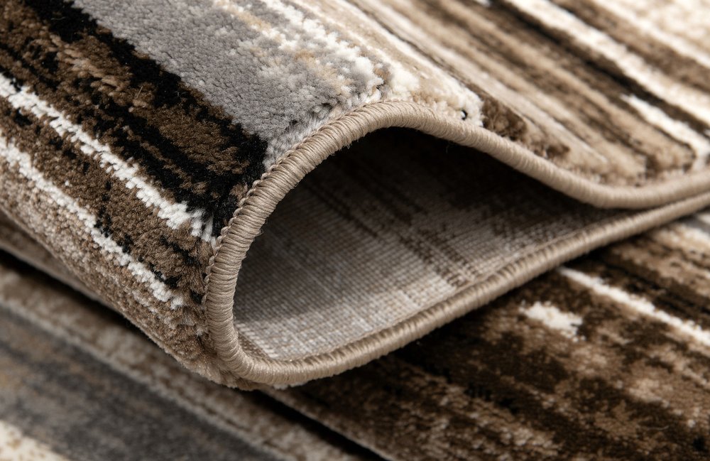 2' X 3' Brown Ivory and Tan Abstract Washable Non Skid Area Rug