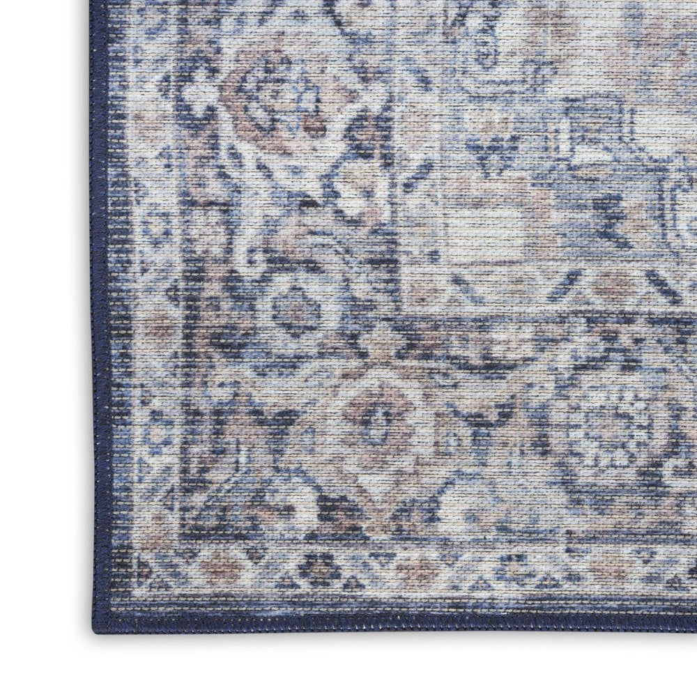 5' X 7' Blue And Pink Floral Power Loom Distressed Washable Area Rug