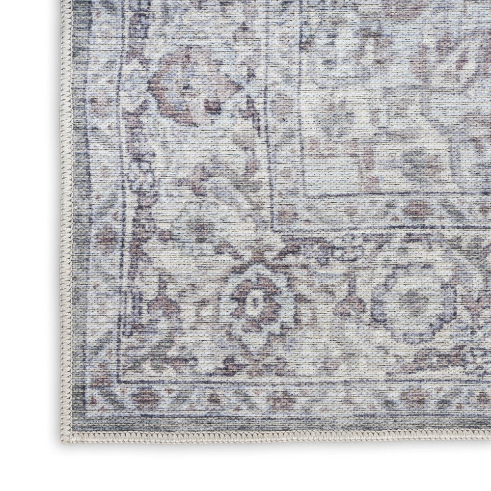 6' X 9' Blue And Pink Floral Power Loom Distressed Washable Area Rug