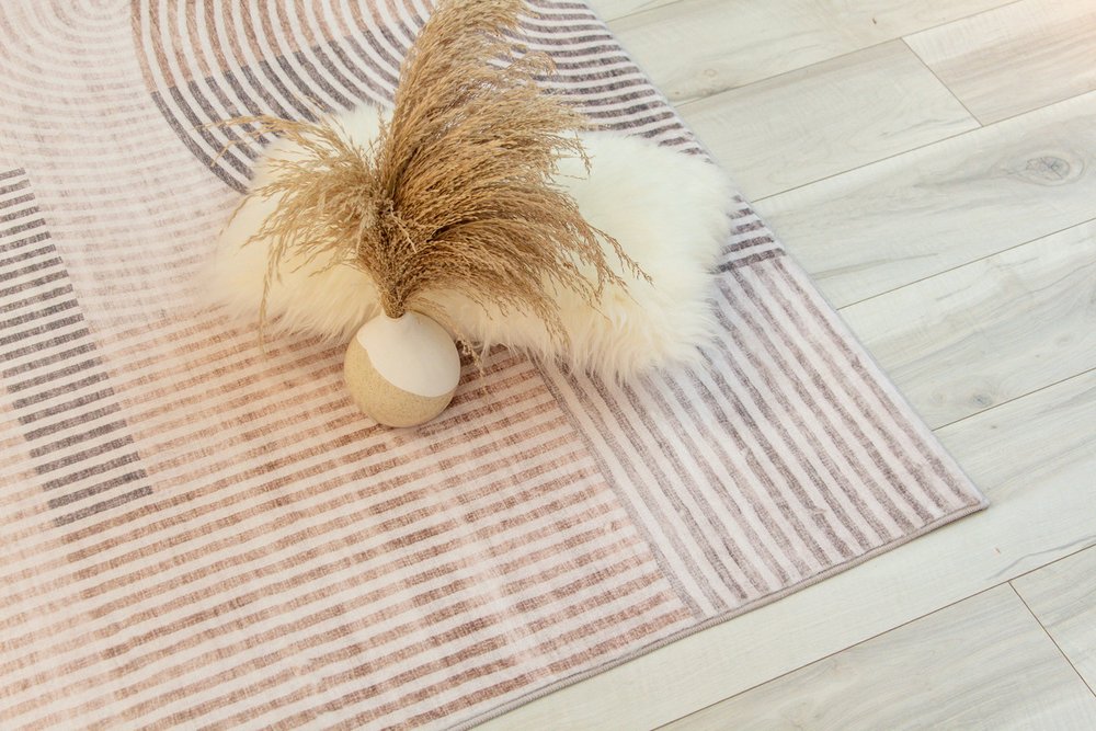 5' X 8' Beige and Brown Abstract Distressed Area Rug