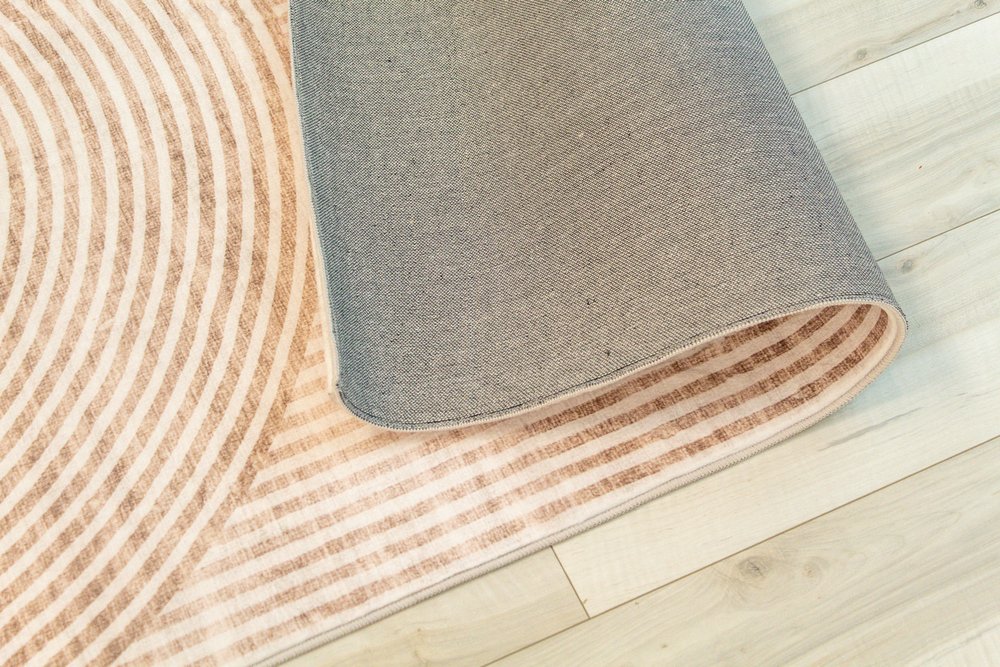 5' X 8' Beige and Brown Abstract Distressed Area Rug