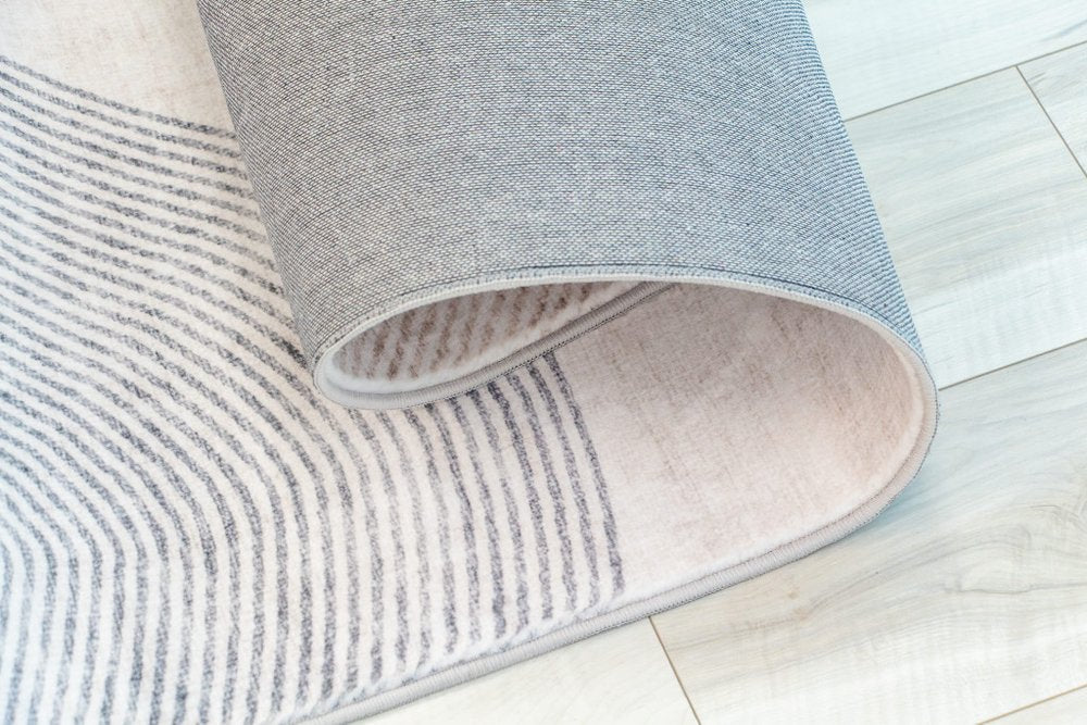 4' X 6' Beige and Brown Abstract Area Rug