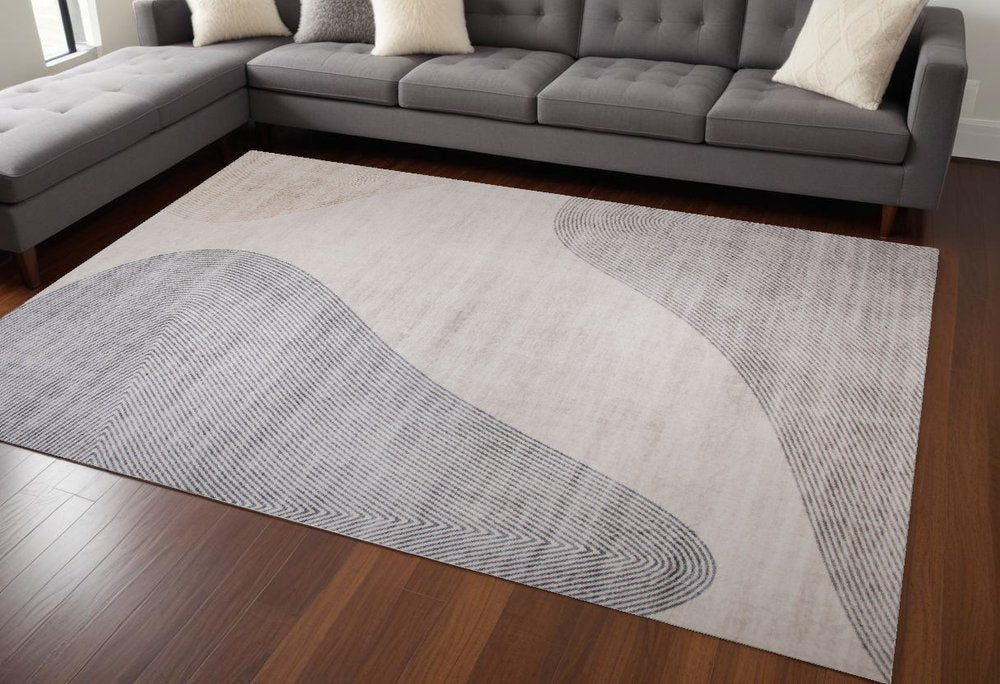 7' X 10' Beige and Brown Abstract Distressed Area Rug