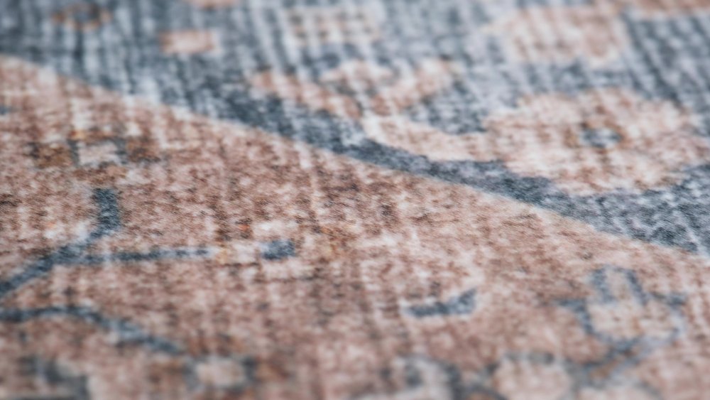 5' X 8' Brown and Blue Floral Distressed Area Rug