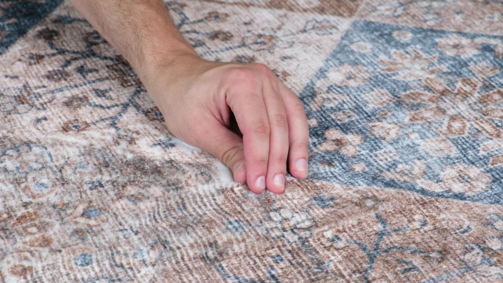 7' X 10' Brown and Blue Floral Distressed Area Rug