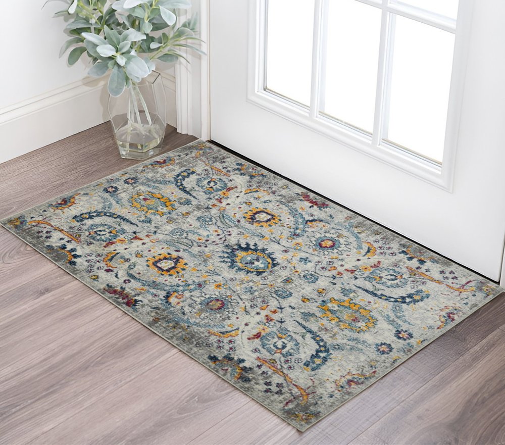 5' X 7' Gray Blue And Orange Area Rug