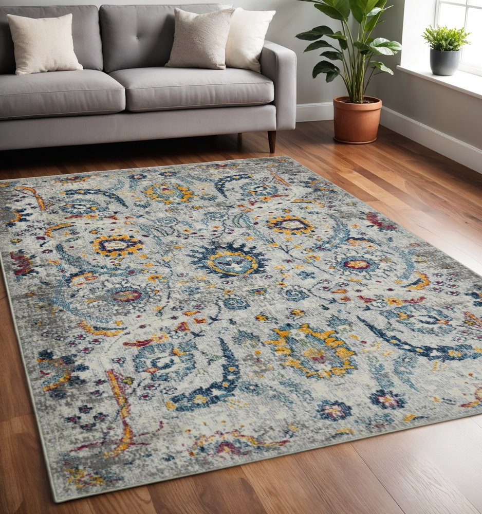 5' X 7' Gray Blue And Orange Area Rug