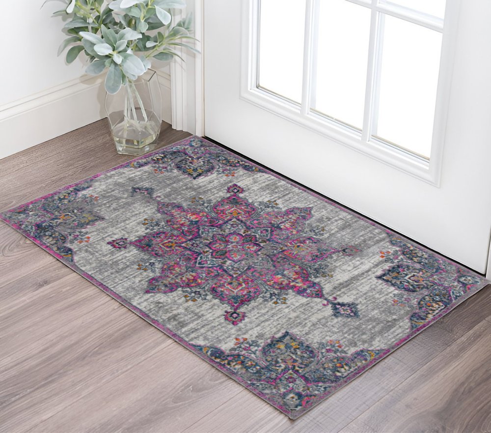 9' X 12' Pink Gray And Blue Area Rug